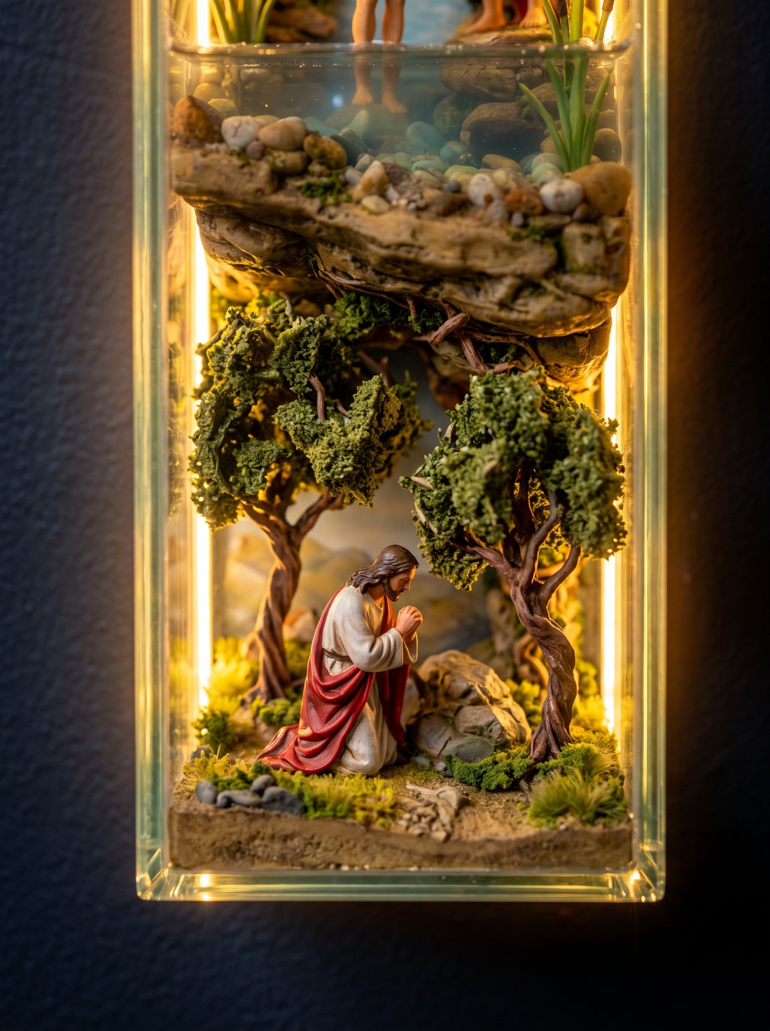 The Garden of Gethsemane scene inside the glass cross
